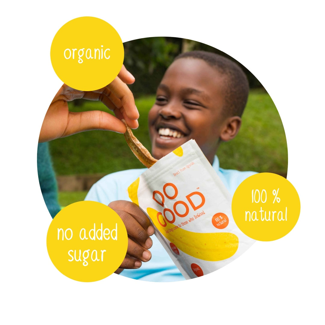 Smiling child enjoying Do Good organic dried banana snack, 100% natural with no added sugar